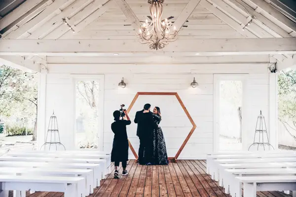 Videographer filming after the wedding ceremony