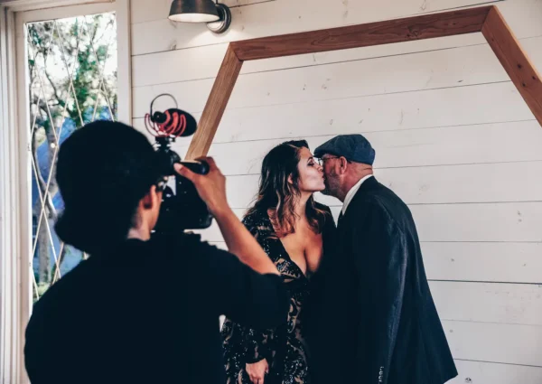 Videographer filming a wedding
