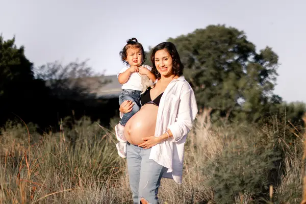 Pregnant Mom With Toddler Photo