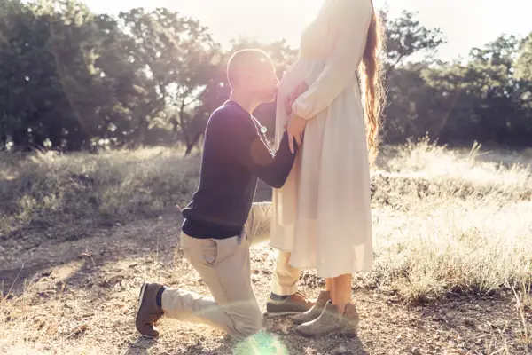 Kissing The Belly Bump Photo Idea