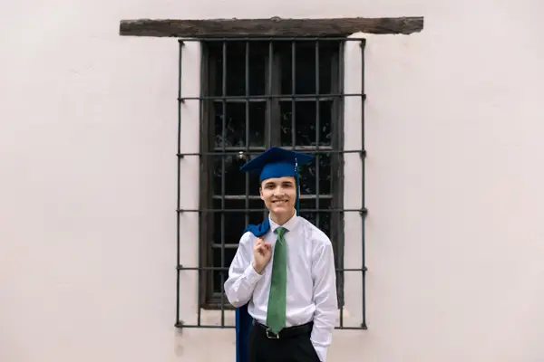 Senior Grad Cap And Gown Smiling Photo Idea