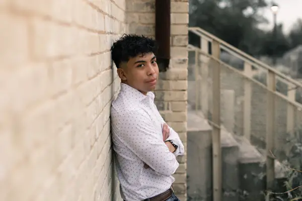 Senior Grad Stone Wall Casual Pose Idea
