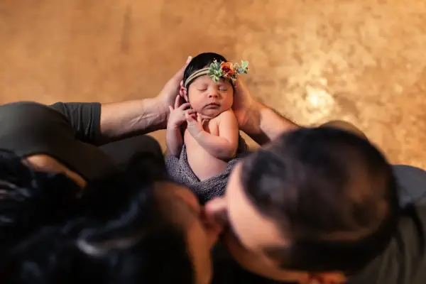 Top Down Shot Of Newborn Baby Home Photoshoot Session